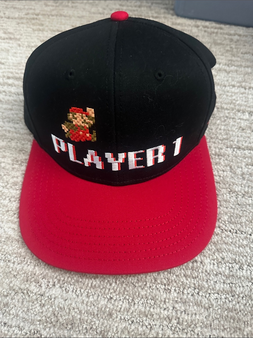 PLAYER1 Black and Red Snapback Hat